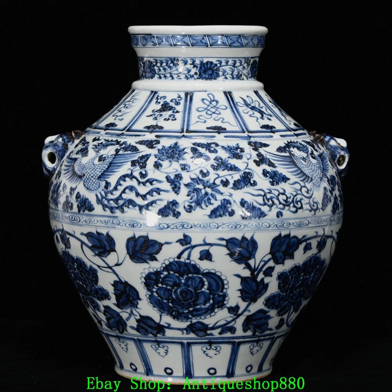 Blue-and-white porcelain peony jar with floral panels and two side loop handles