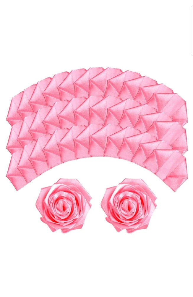 Pink satin rose petals with two small ribbon rose flowers