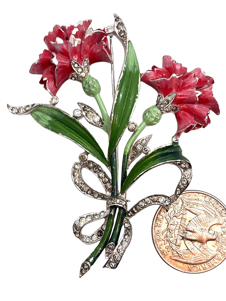 Pink carnation figural brooch with green leaves, silver-tone rhinestone accents