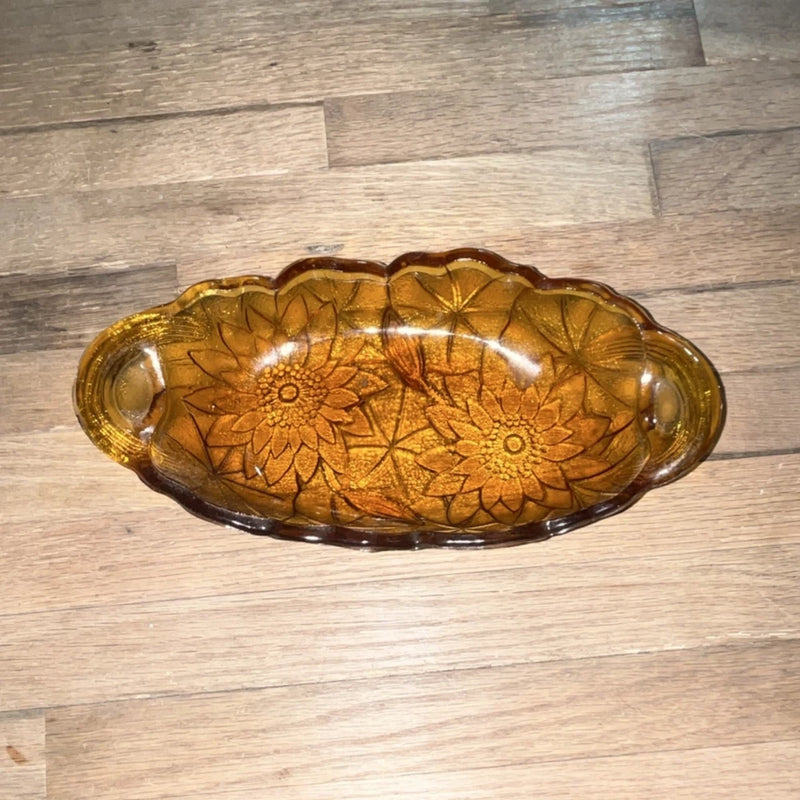 Amber glass oval tray with engraved sunflower pattern