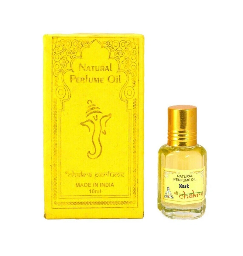 Natural perfume oil 10 ml bottle with gold cap and yellow box
