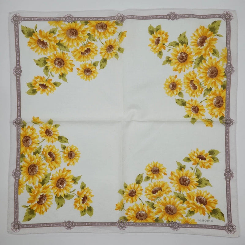 White cotton square scarf with yellow sunflower print and border detailing