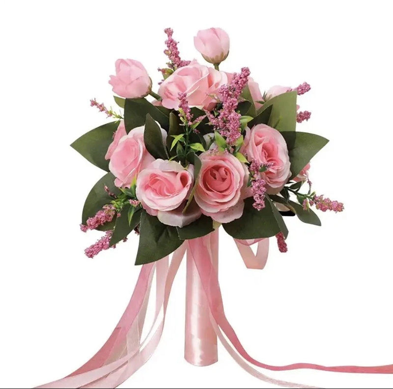 Pink artificial rose bouquet with greenery and long satin ribbons for wedding