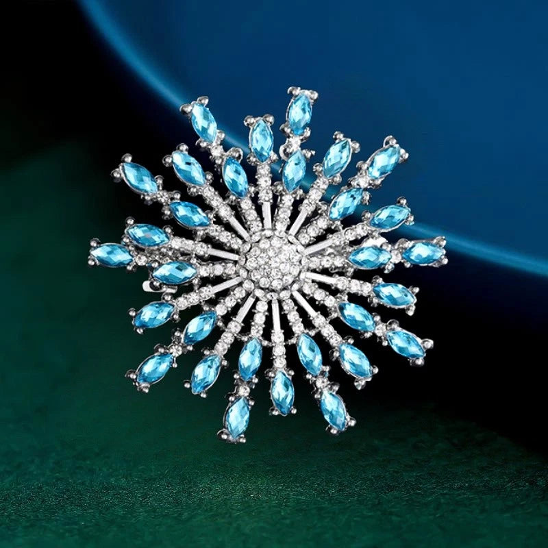 Blue crystal rhinestone sunflower brooch pin with silver-toned starburst center
