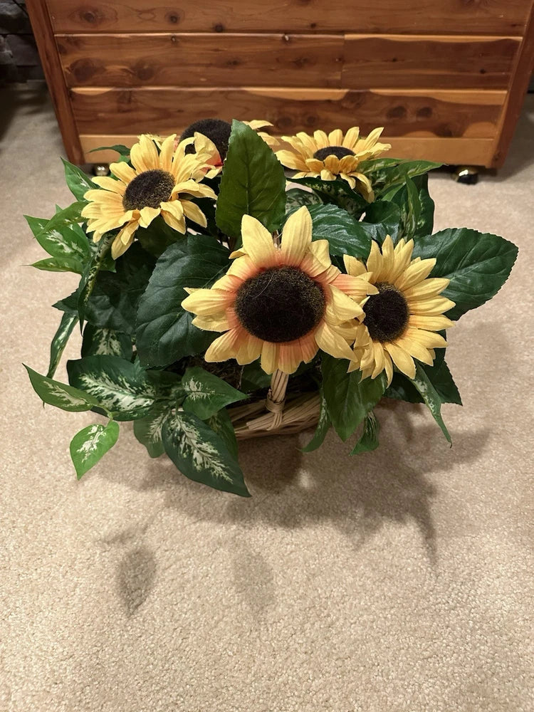 Basket faux silk sunflower arrangement with yellow blossoms and green leafy greenery