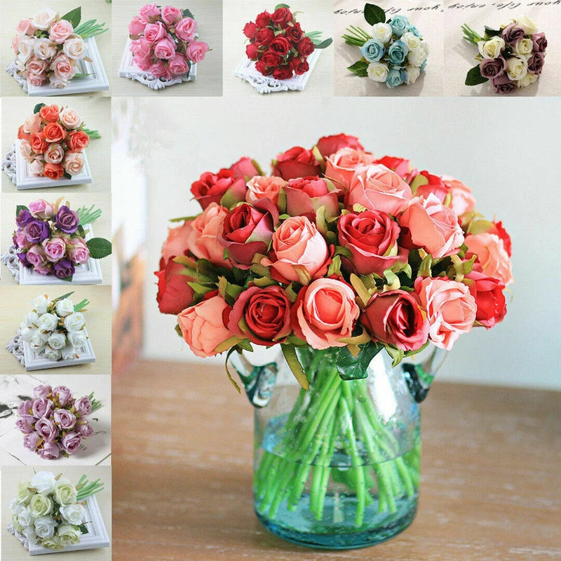 Silk rose wedding bouquet with coral and pink faux blooms in blue glass vase