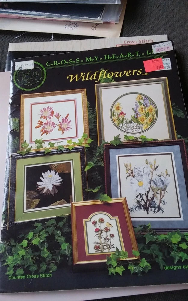 Wildflowers cross stitch pattern chart with framed floral motifs on printed package