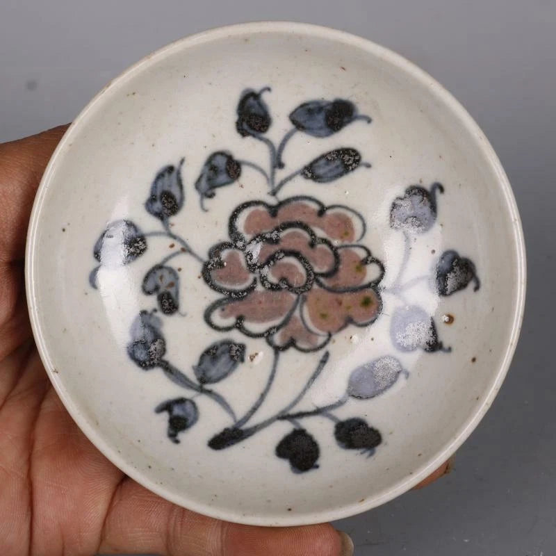 Porcelain plate with blue floral peony and red accent glaze, round rim