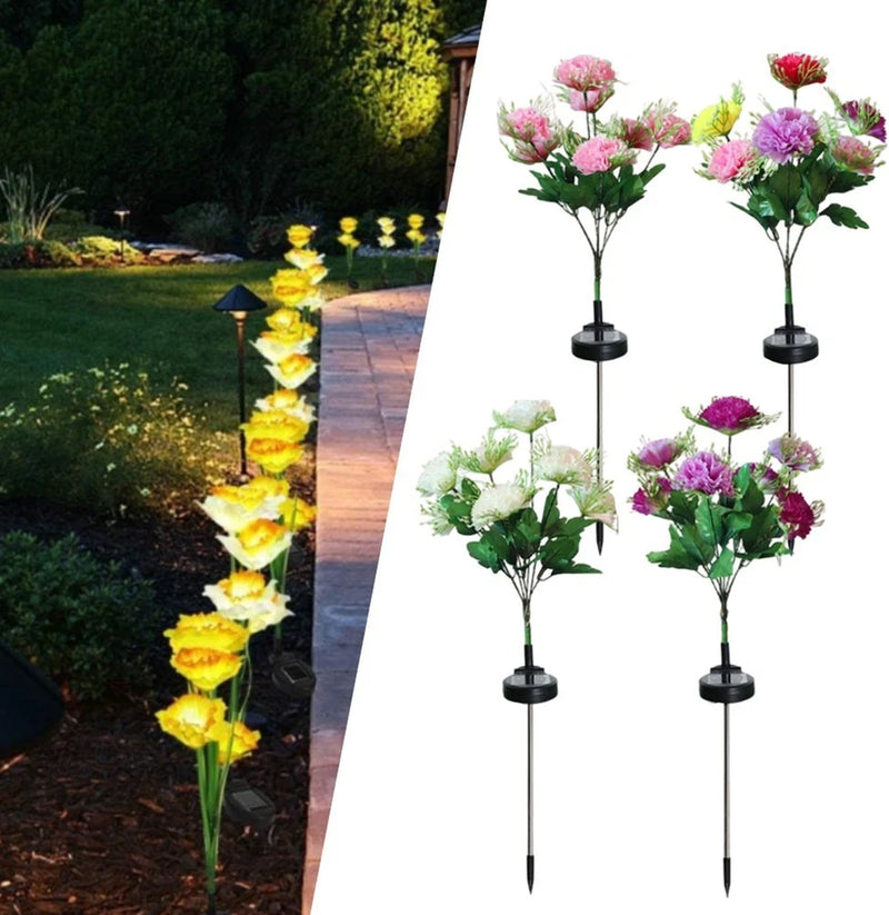 Two solar carnation garden lights with LED flower heads on metal stakes