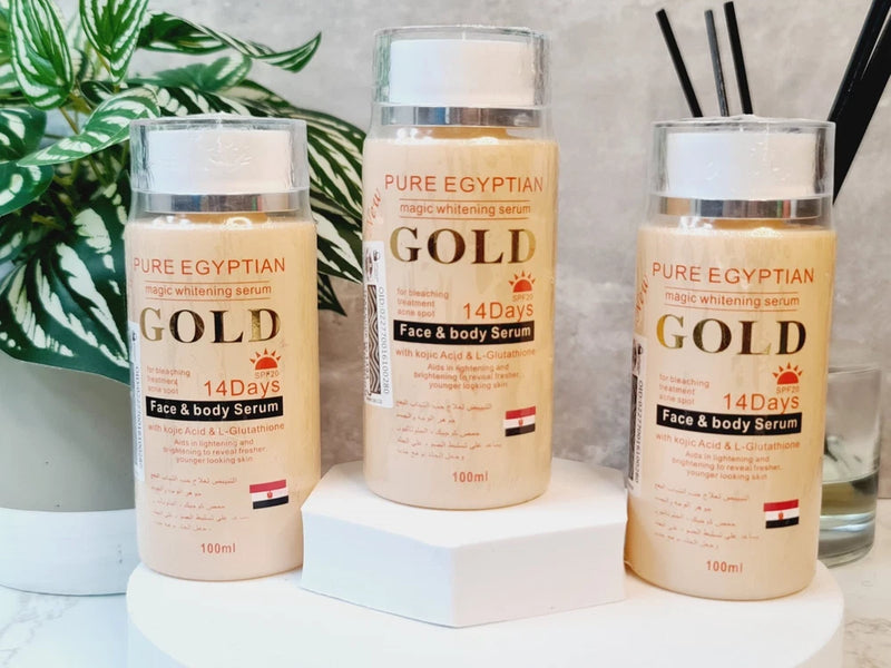 Gold face and body serum bottles, 100 ml, clear screw caps and labeled jars