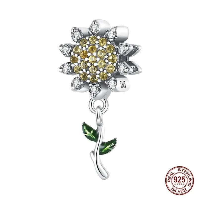 925 sterling silver sunflower charm with crystal stones and green leaf drop