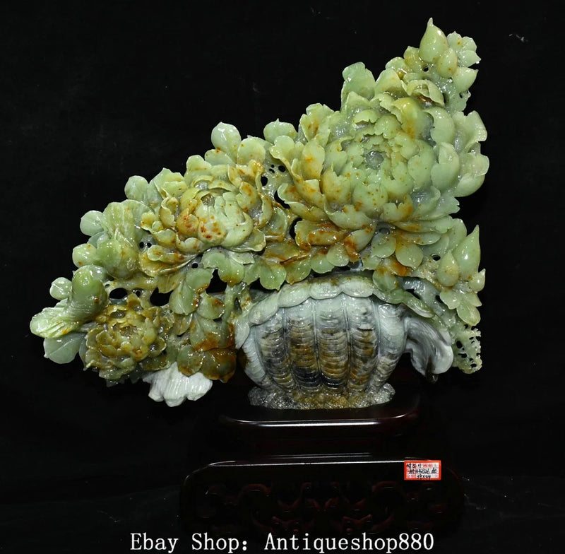 Carved jade peony flower basket sculpture with layered blossoms and basket base