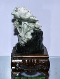 Natural jade peony flower stump carving statue on dark stone base with wooden stand