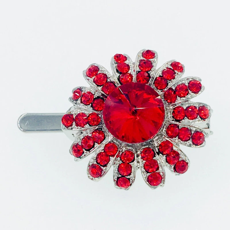 Red rhinestone sunflower hair clip with crystal center and metal barrette base
