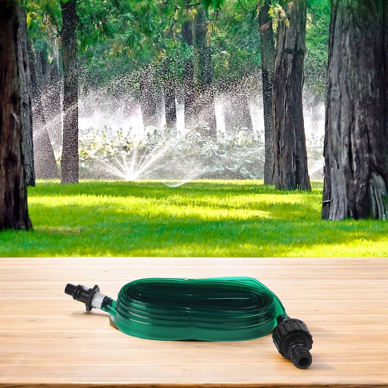 Green garden hose sprinkler with coiled tubing and two end connectors