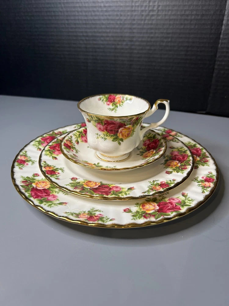 Bone china tea cup, saucer, and side plate with Old Country Roses and gold trim