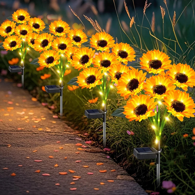 Solar sunflower garden lights with glowing LEDs on metal stakes, 4-pack