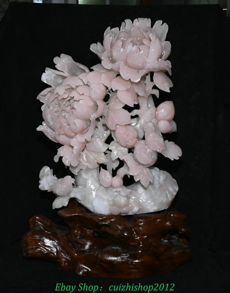 Pink jade carving statue with peony flowers and birds on a dark base