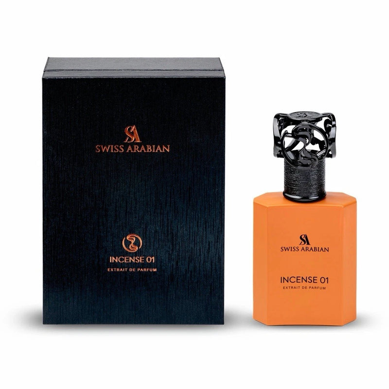 Orange perfume bottle with black cap, SWISS ARABIAN Incense 01 label