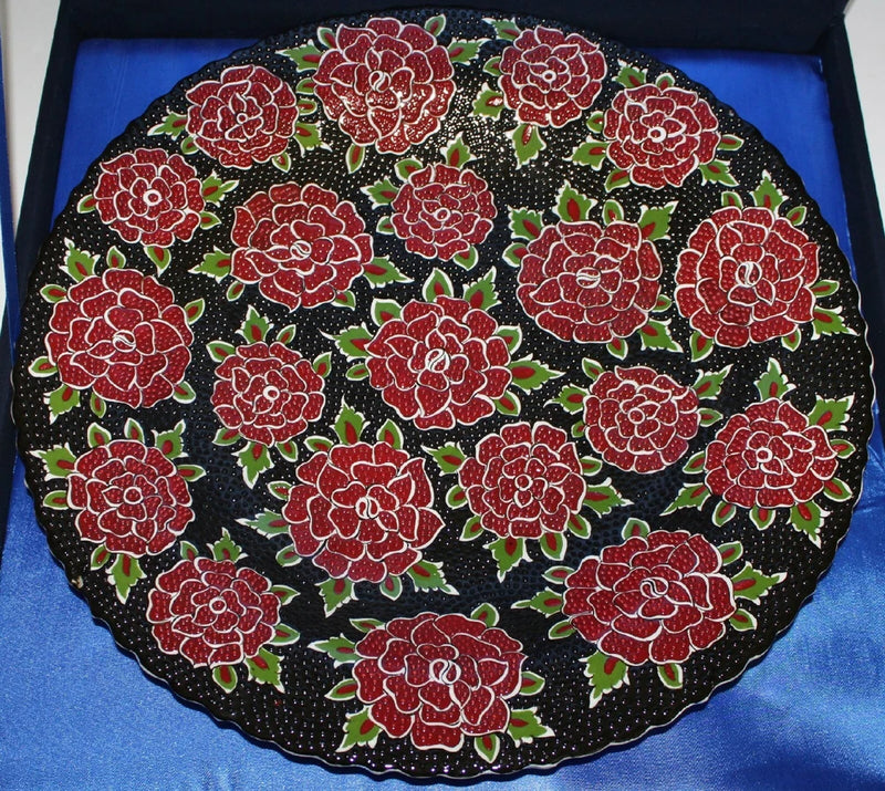 Handpainted ceramic plate, round 16-inch, black with red floral carnations and green leaves