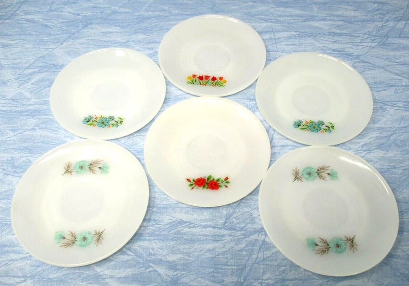 Set of six floral painted milk glass saucers with colorful flower motifs