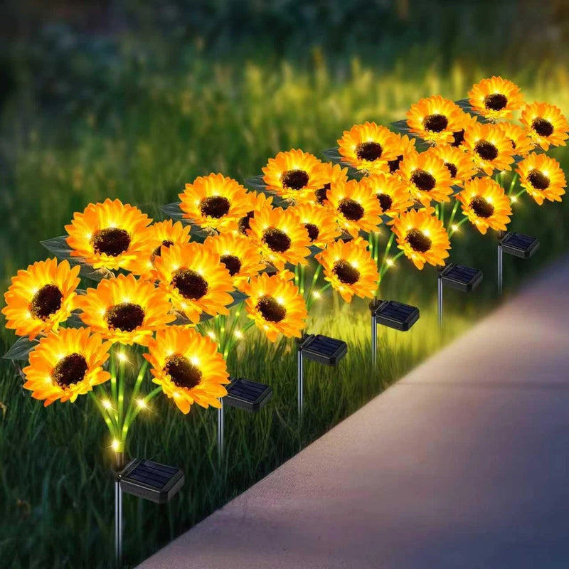 Solar sunflower garden lights, orange-yellow blooms with black centers on stakes