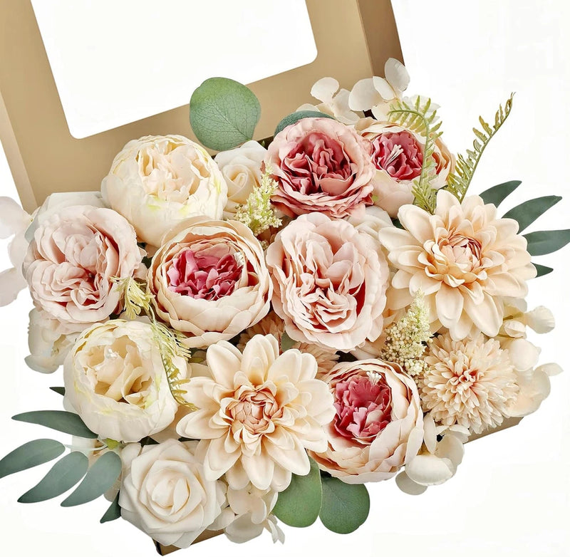Artificial faux flower bouquet with cream, blush, and red roses, peonies, and green leaves