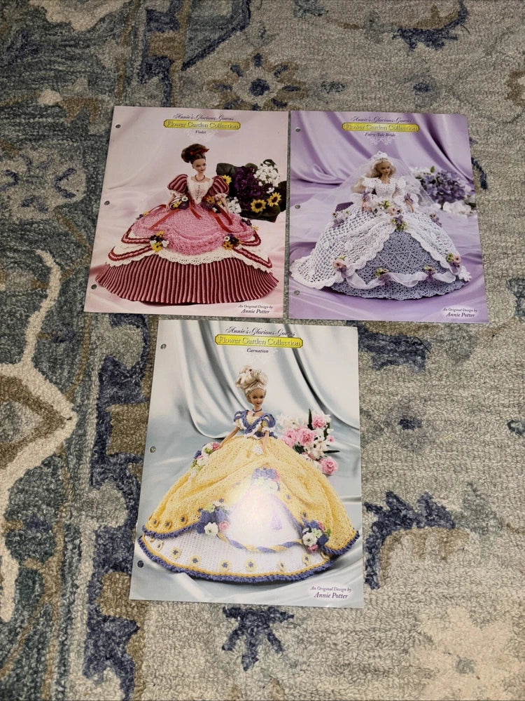Set of 3 doll dress cards in pink, violet, and yellow with floral details