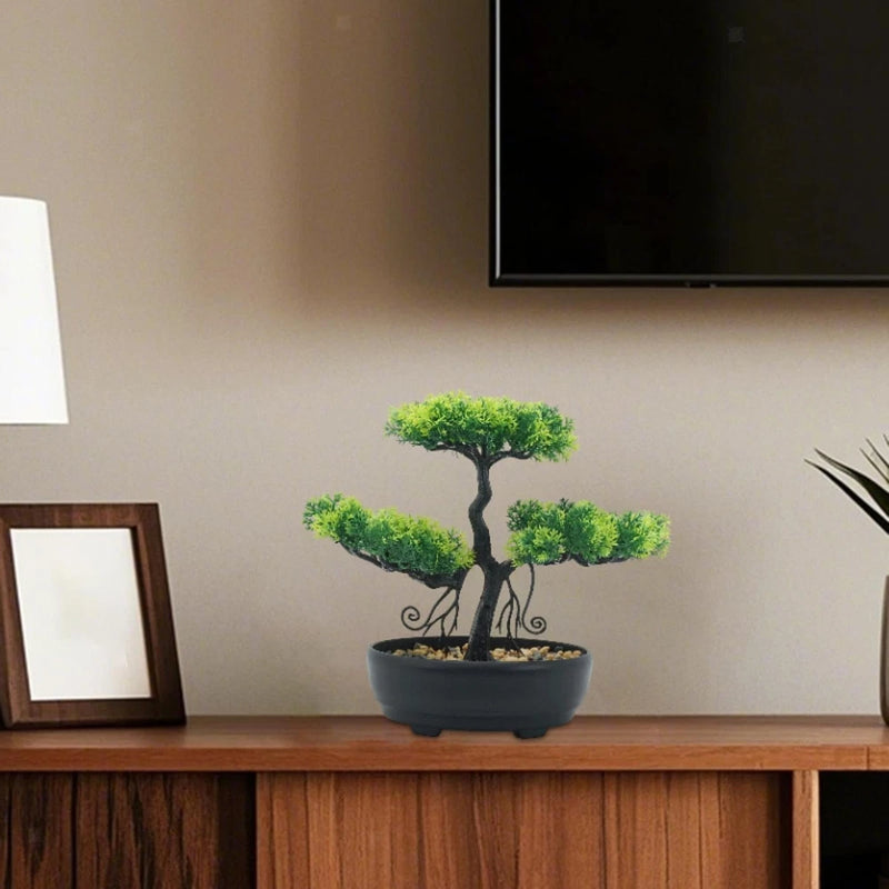 Artificial bonsai tree with bright green foliage in blue-gray round planter pot