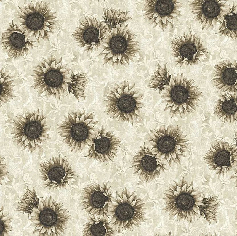 Ecru quilting fabric with scattered sunflower toss print in dark brown and beige