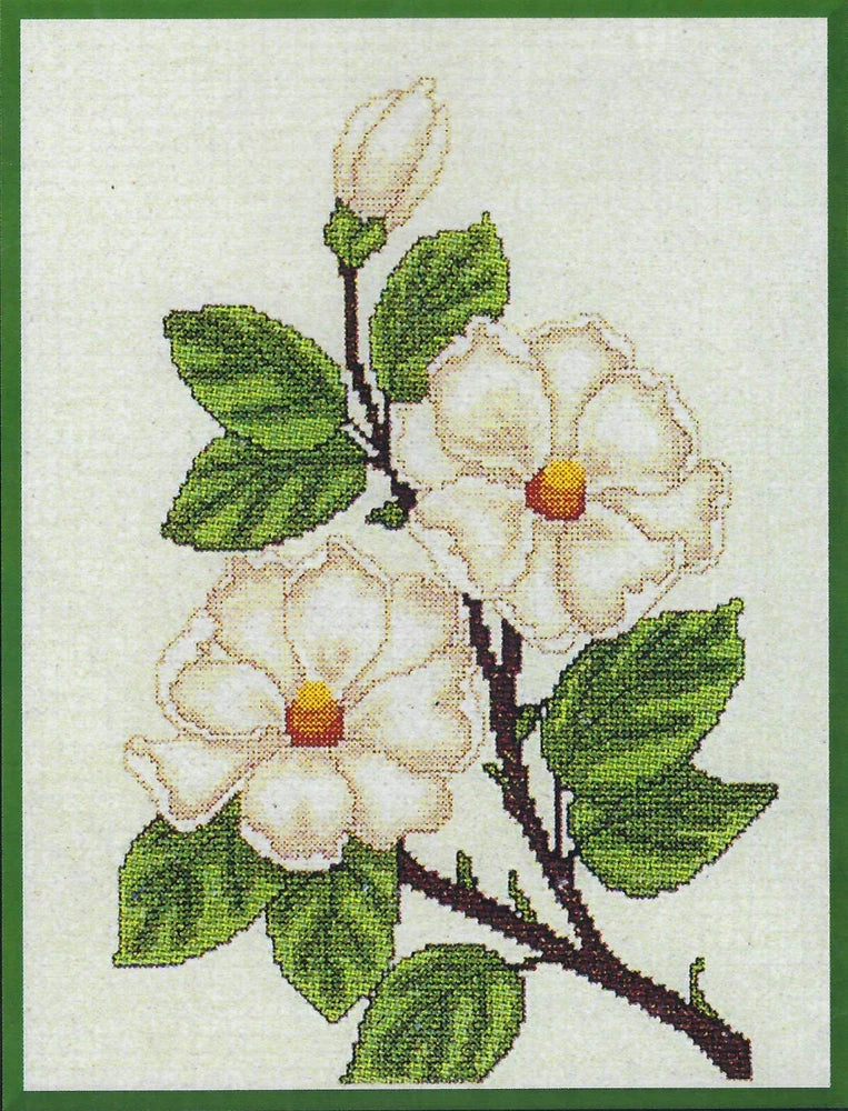 Counted cross stitch pattern leaflet with white flowers and green leaves