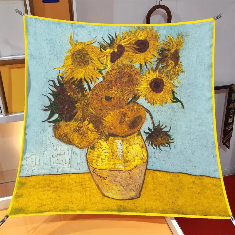 Square silk scarf with light blue background and yellow sunflower bouquet print