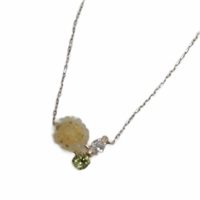 Sunflower pendant necklace with small crystal details on fine chain