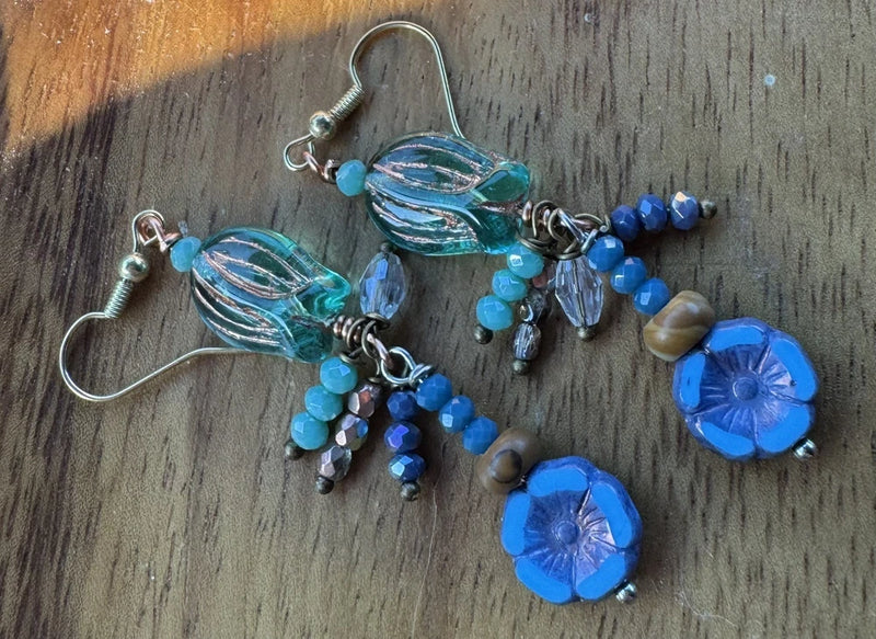 Blue glass flower dangle earrings with bead tassels and fishhook backs