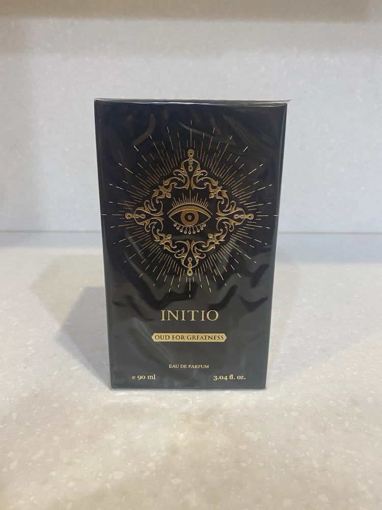 Initio oud eau de parfum 3.0 fl oz dark box with gold ornate emblem and logo