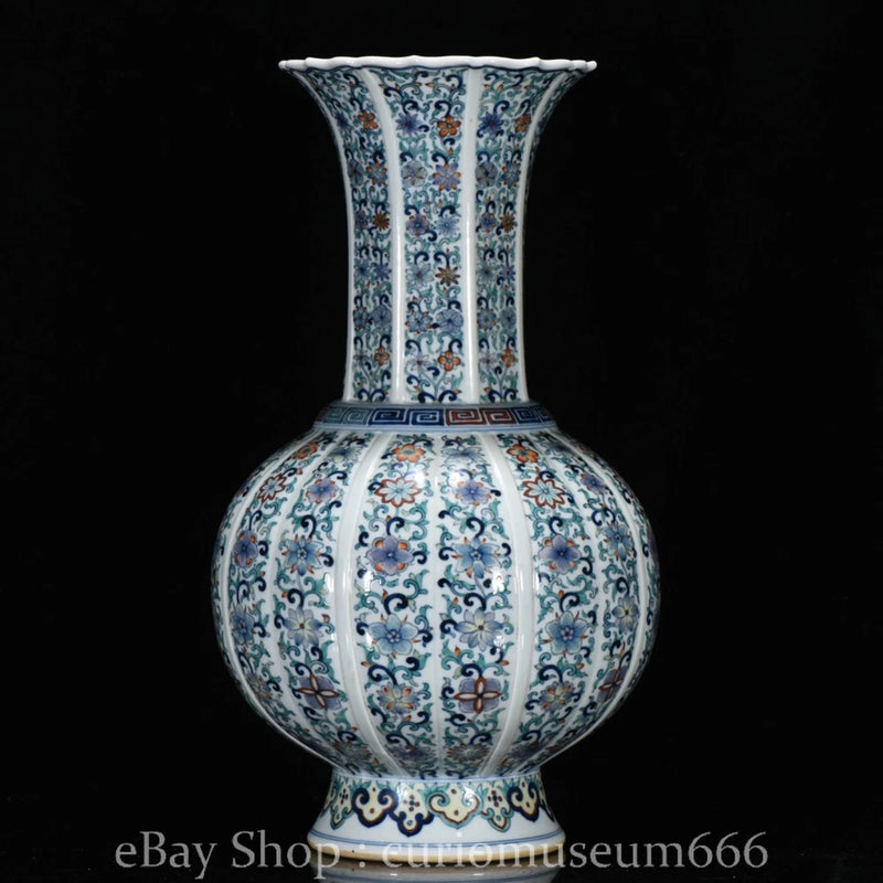 Blue and white porcelain vase with flared rim, lotus and peony motif, round body