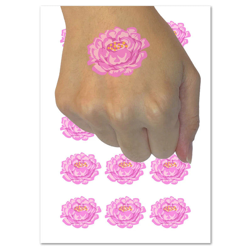 Peony flower temporary tattoo on hand, pink petals with small yellow center, set of decals