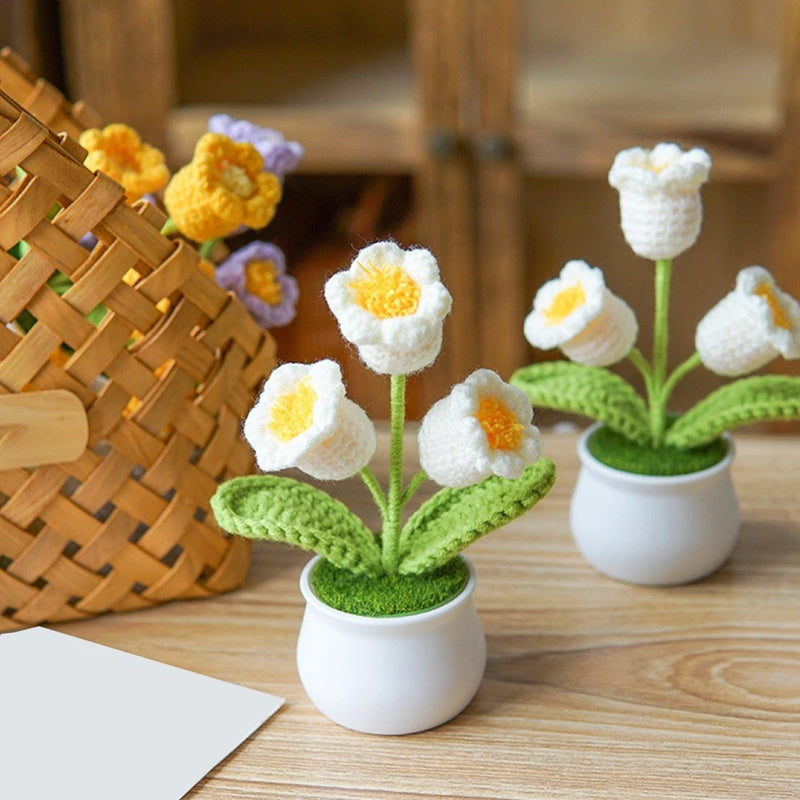 Artificial crochet lily-of-the-valley plant with white flowers and green leaves in white pot