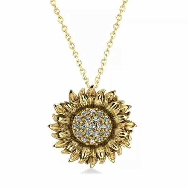 Gold-plated sunflower pendant necklace with round blue stone center and textured petals
