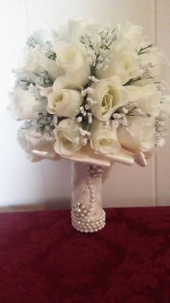Ivory and silver wedding bouquet with faux pearl brooch handle and rose-style flowers