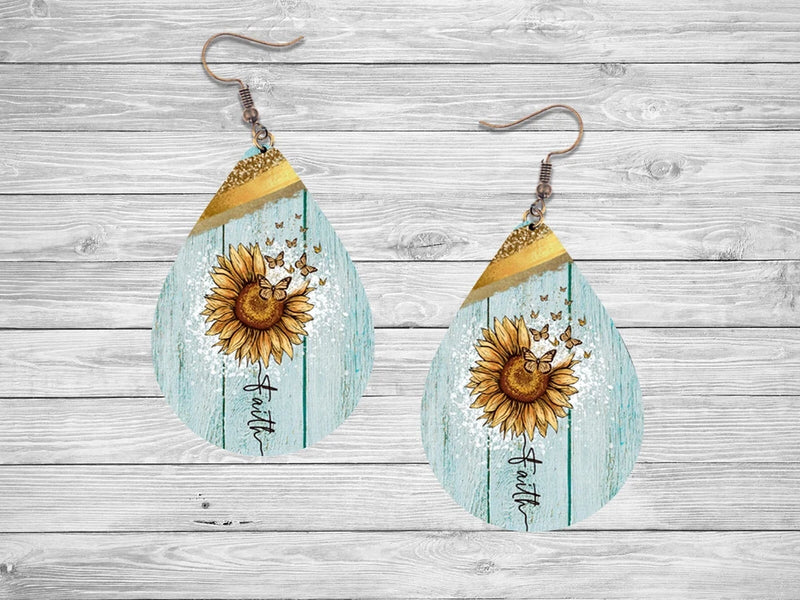Teardrop dangle earrings with blue wood grain, sunflower and gold faith print, fishhook backs