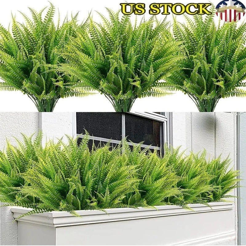 Artificial Boston fern plants with dense green fronds in white rectangular planter