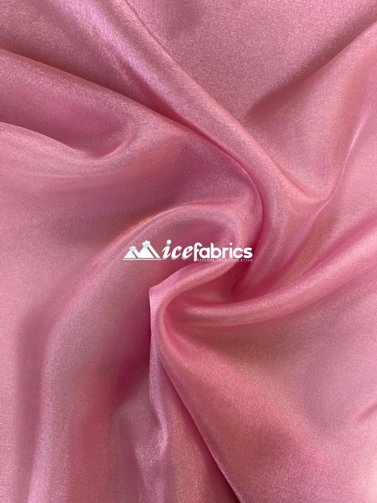 Dusty rose organza fabric, sheer crystal-like drape with smooth folds