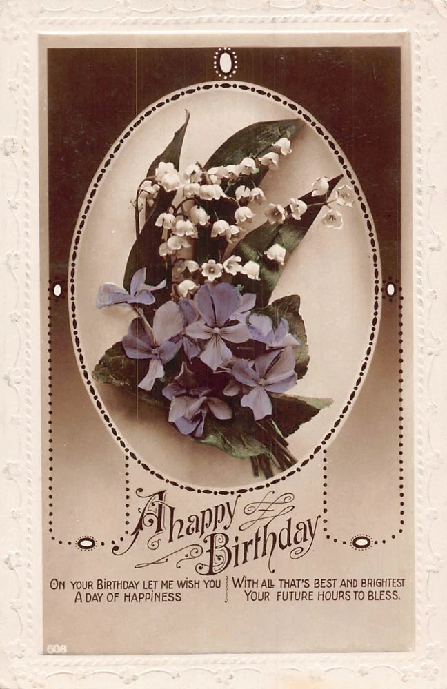 Vintage Happy Birthday postcard with oval bouquet of purple and white flowers