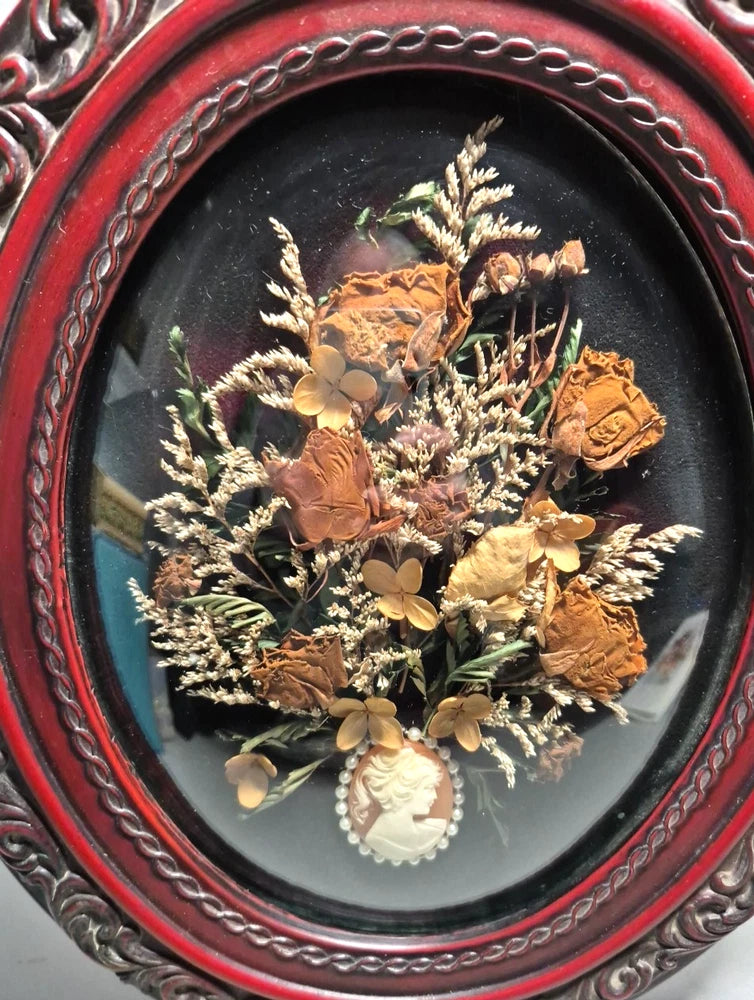 Victorian dried flower art glass dome with cameo, gold roses and leaves inside