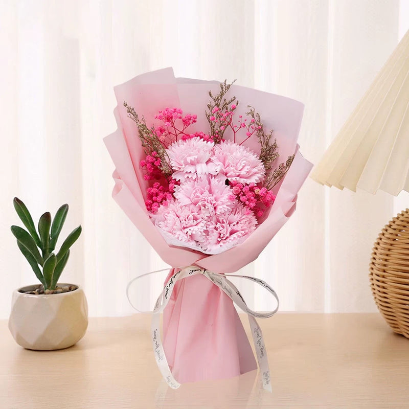 Pink soap flower bouquet with ribbon wrap and realistic roses