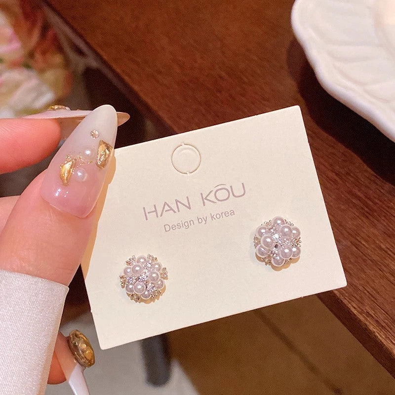 Floral pearl and crystal cluster stud earrings with round bouquet design, gold-tone posts