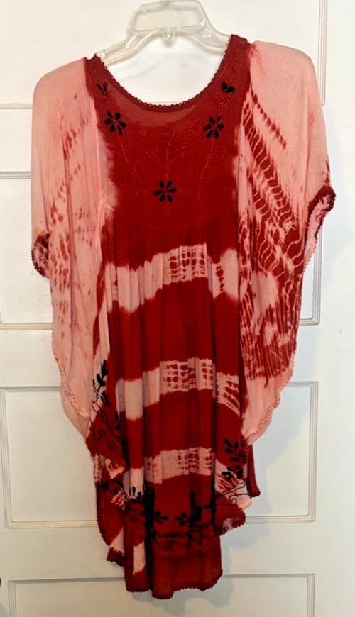 Women's red and pink loose blouse with floral embroidery and striped tie-dye hem