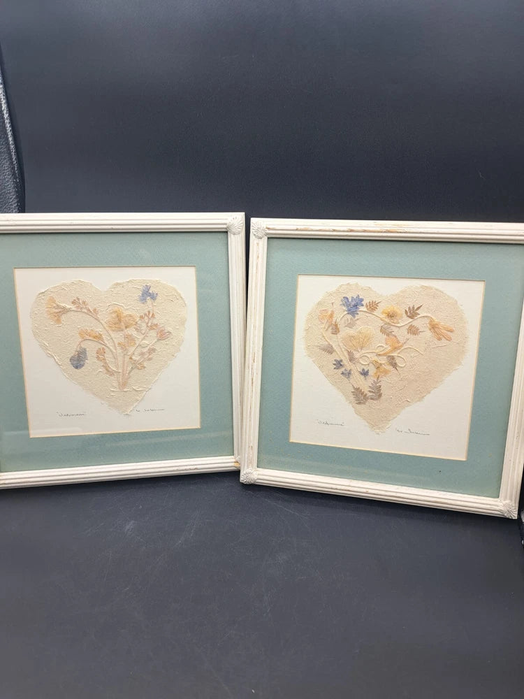 Set of two framed heart-shaped dried flower wall art with light wood frames