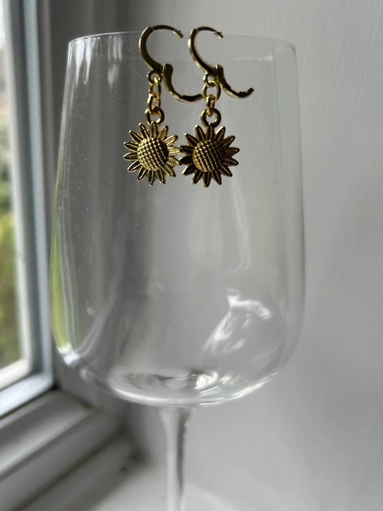 Small gold sunflower beaded dangle earrings with lever-back hooks